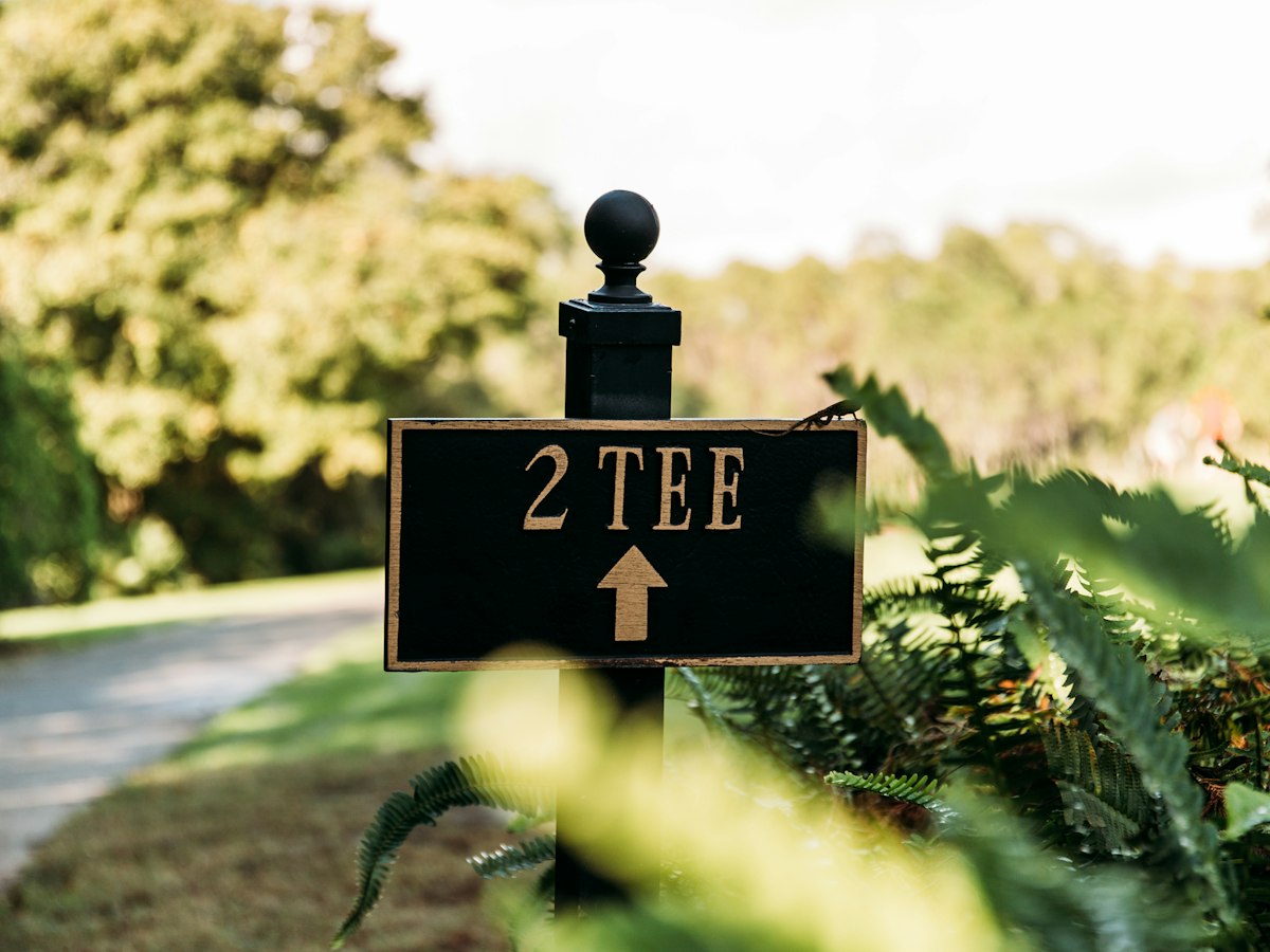 Engraved wooden golf tee marker